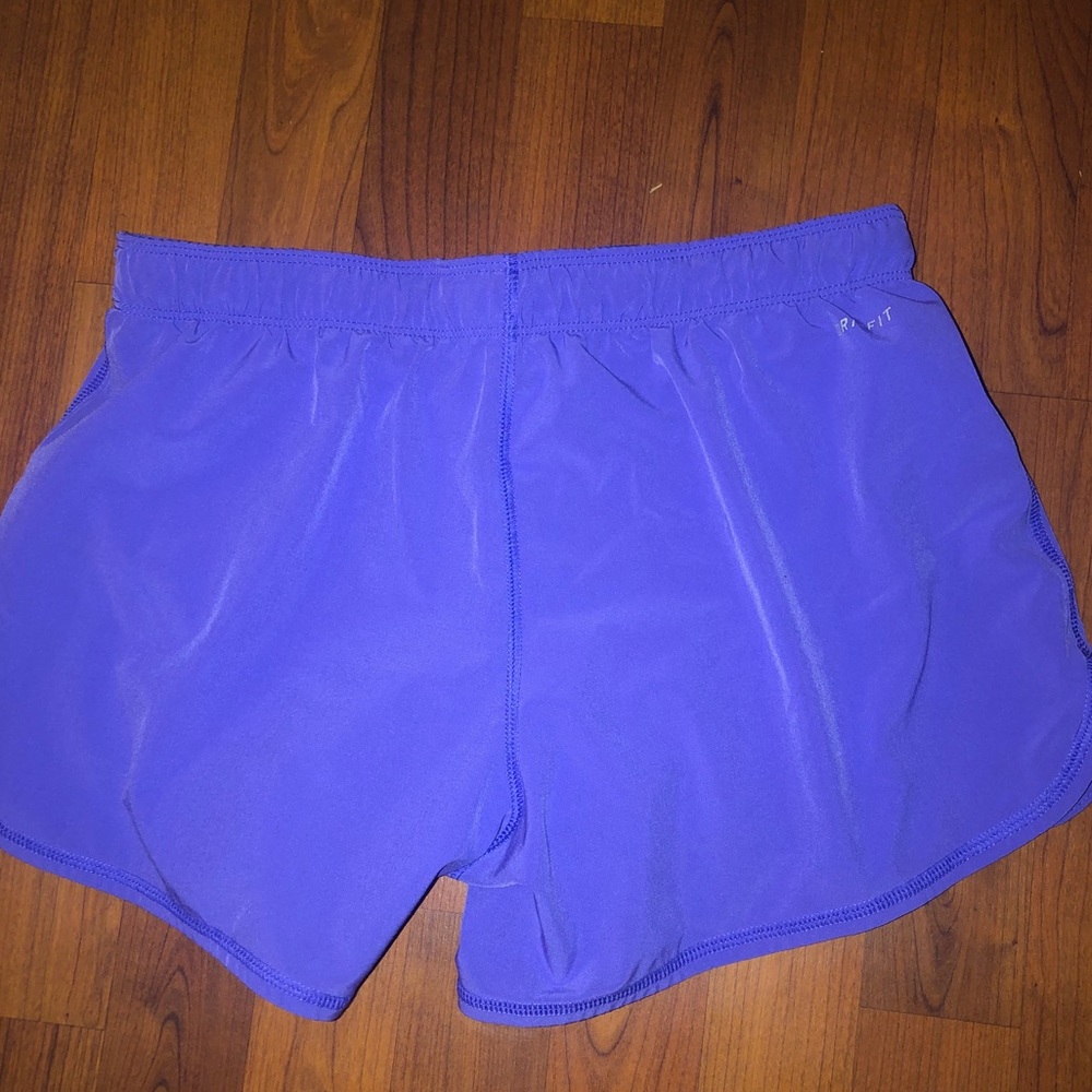 Purple Nike shorts